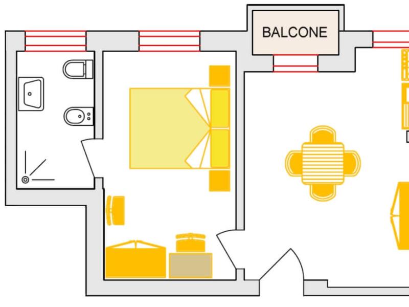 Piccolo appartamento con balcone, camera, bagno e soggiorno-cucina.